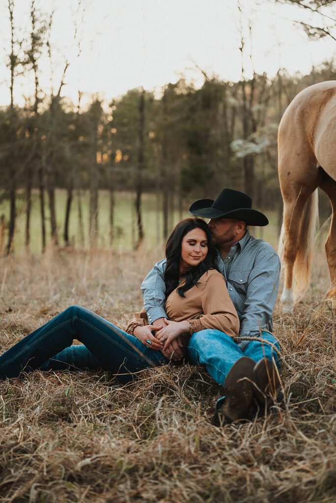 engagement pictures with cowboy hat
